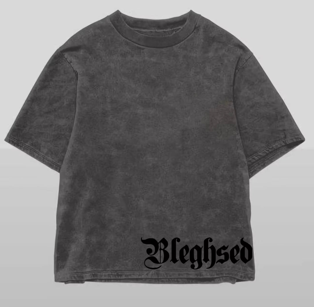 Gray t-shirt with 'Bleghsed' text on a light gray background
